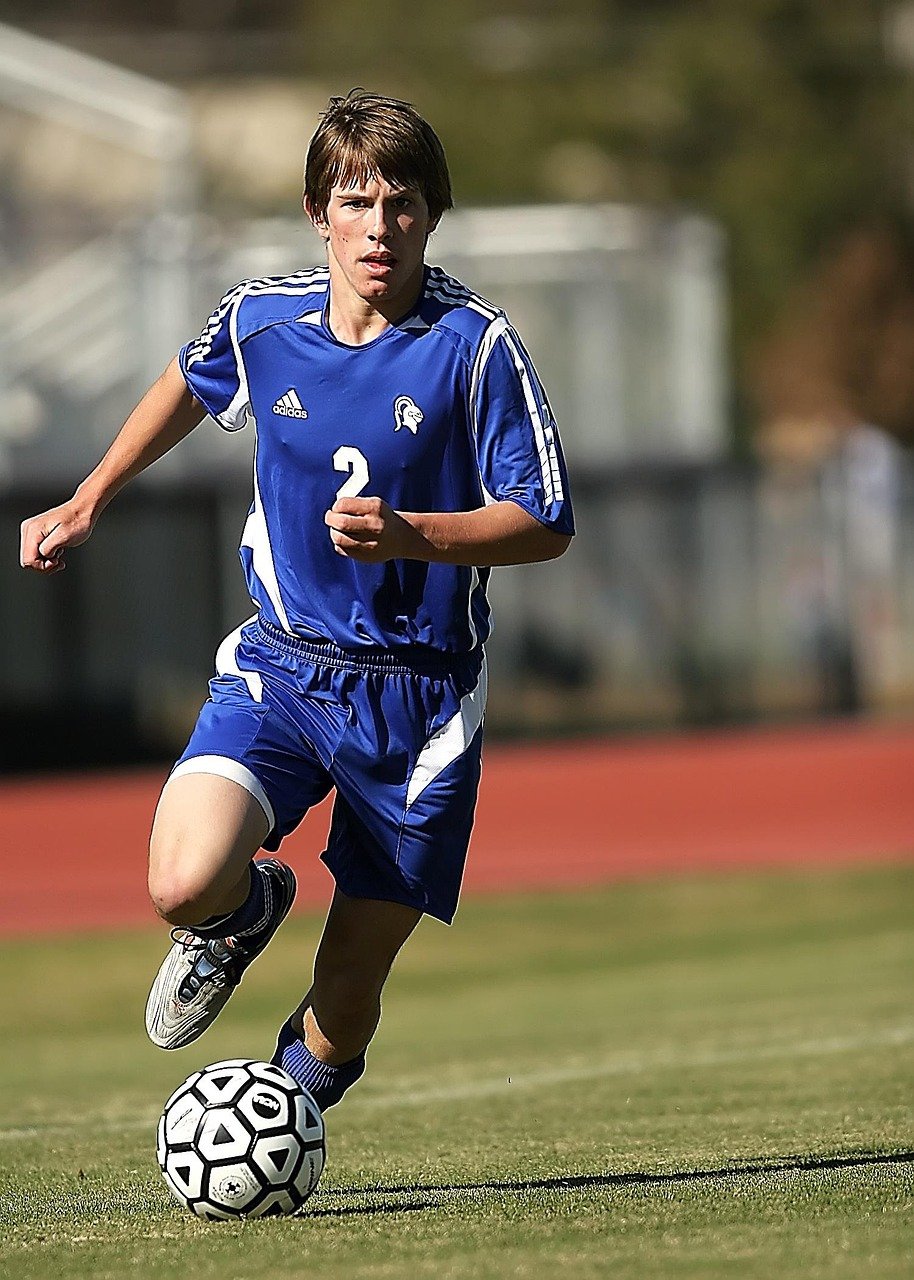 soccer, football, soccer player, nature, football player, sport, ball, game, player, field, grass, boy, competition, action, soccer ball, sports balls, kicking, football game, action photo, kick, attacker